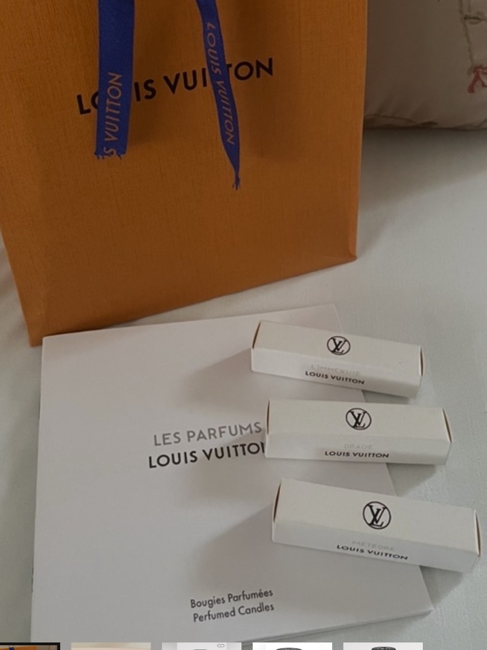 Louis Vuitton miniature fragrance samples,  with LV  gift bag.